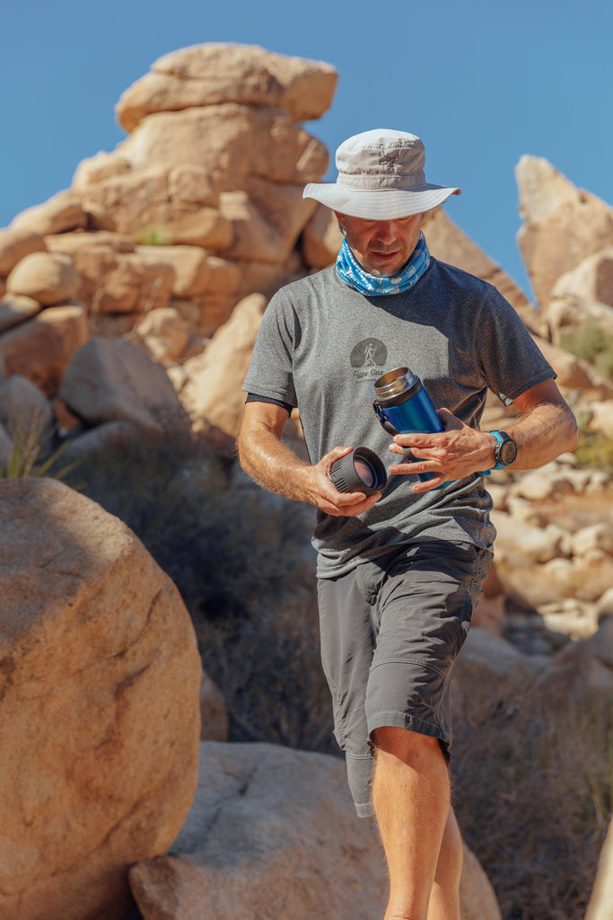 4AllFamily Insulin Cooler - Picture showing diabetic traveler in the desert keeping insulin pens cool with 4AllFamily